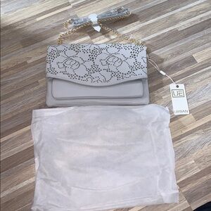 Urban expressions floral laser cut crossbody!